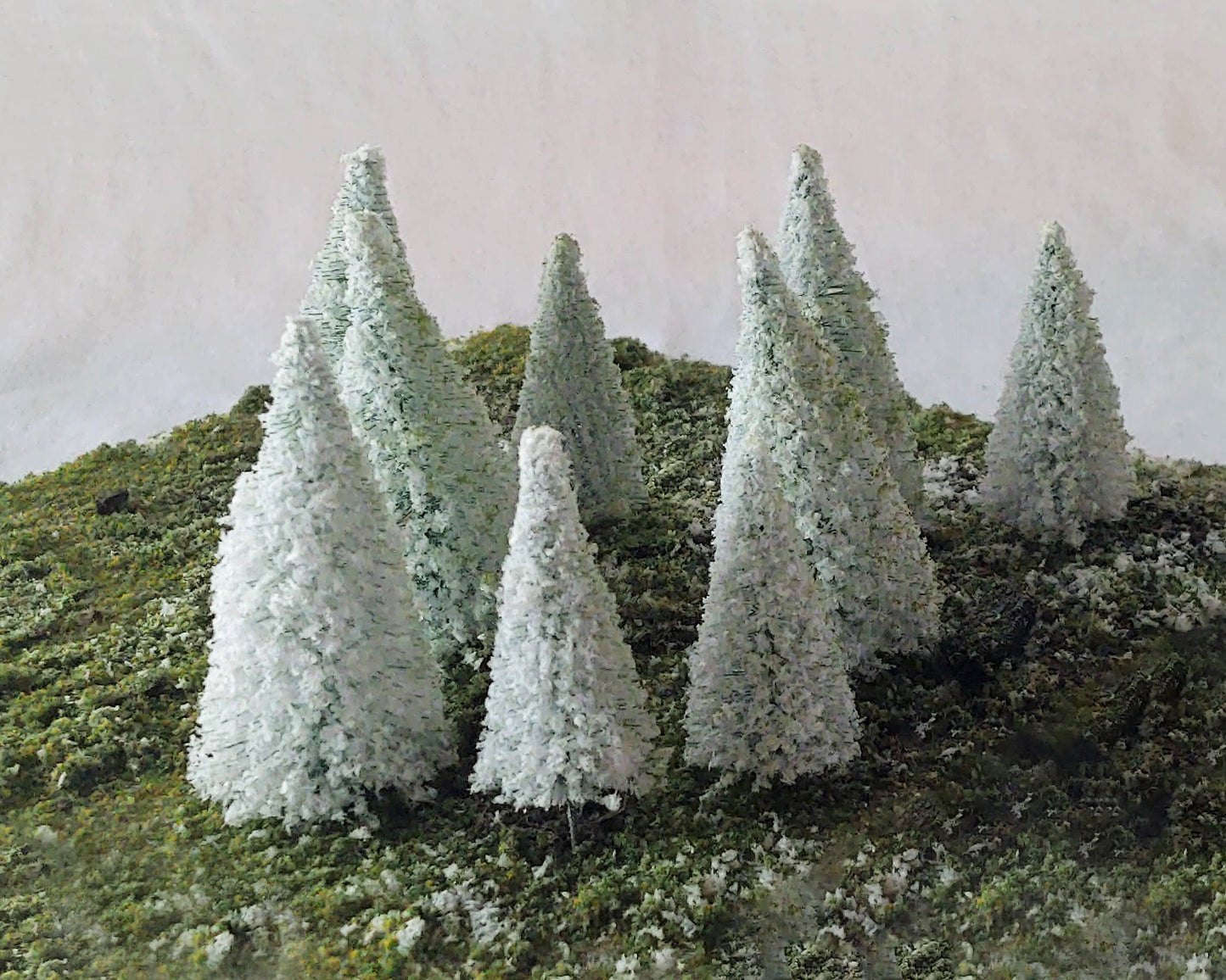 12 piece snow covered pines for model railroading 